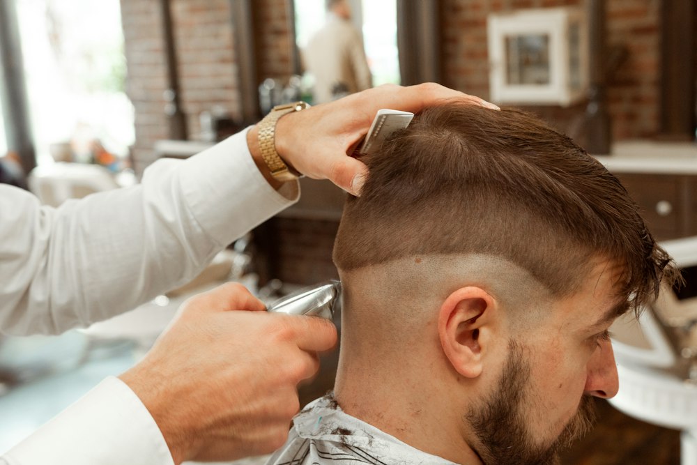 Barber at work in his shop